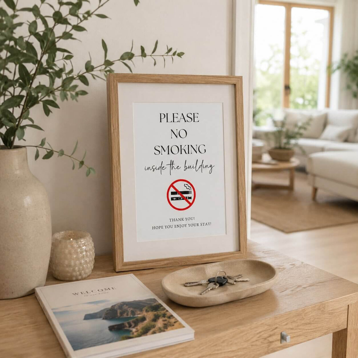 Framed Airbnb no-smoking sign displayed on a light oak entrance console