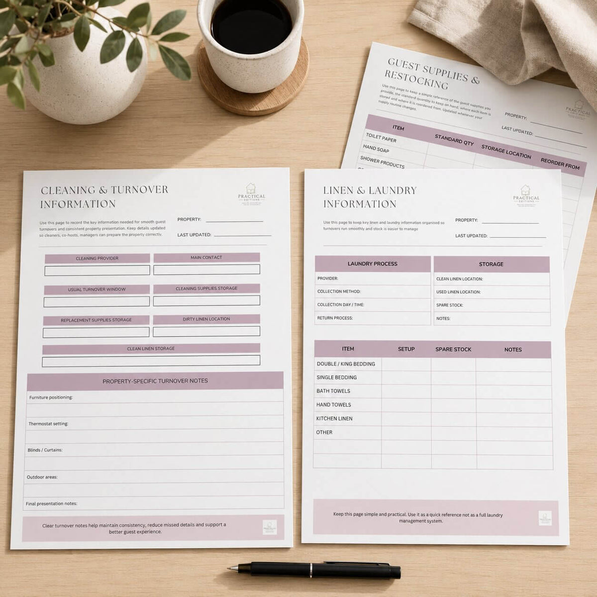 Two printed property management paperwork sheets laid on a wooden table, with a plant pot, coffee cup, and folded cloth nearby. The sheets have clean white backgrounds with soft mauve-pink headers and black text.